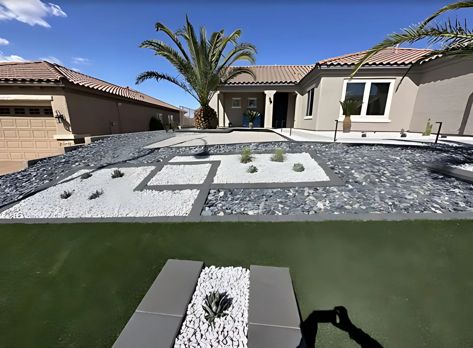 Front yard rock beds and turf lawn