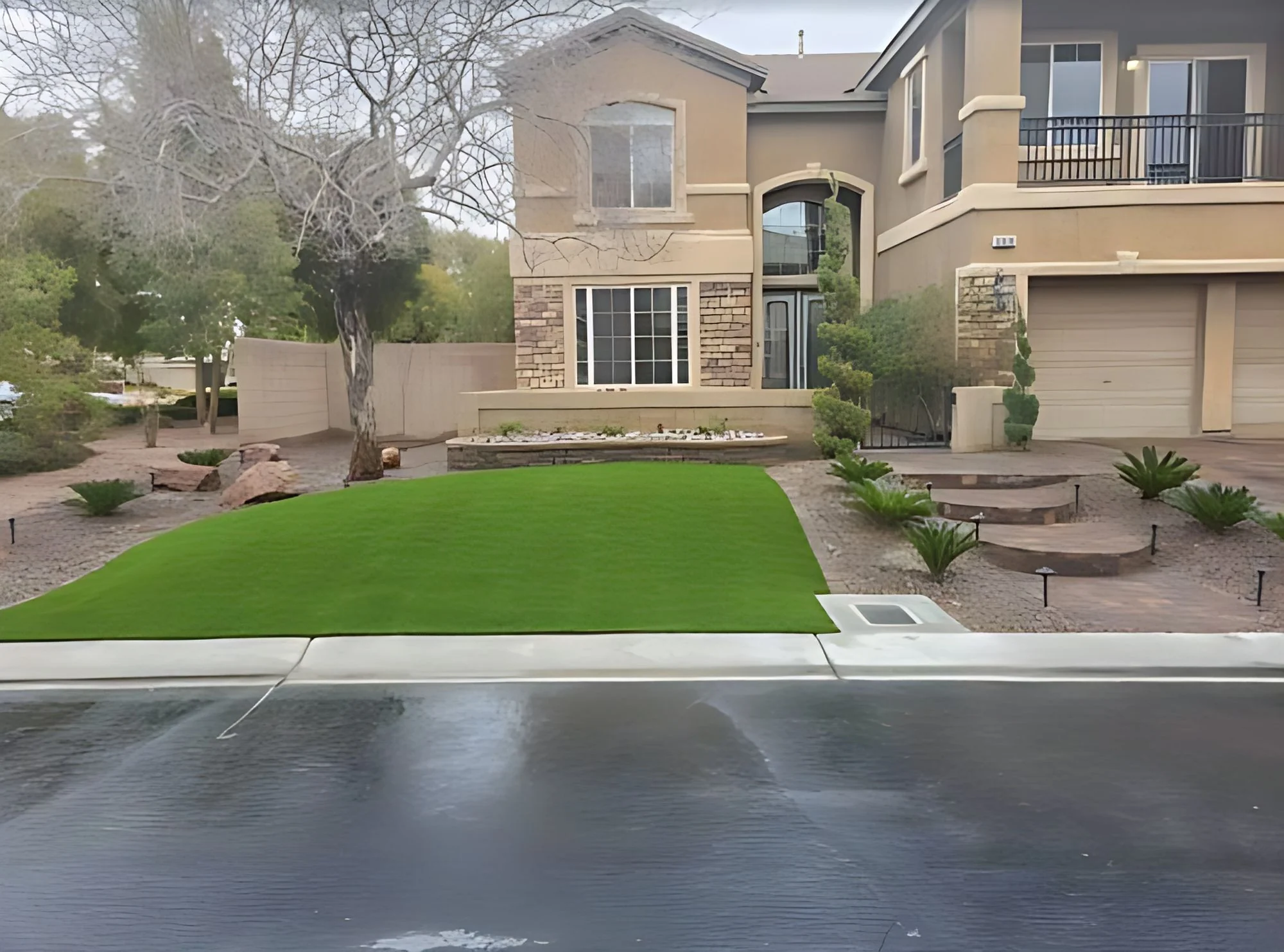 Two Story Frontage, turf lawn and drive approach